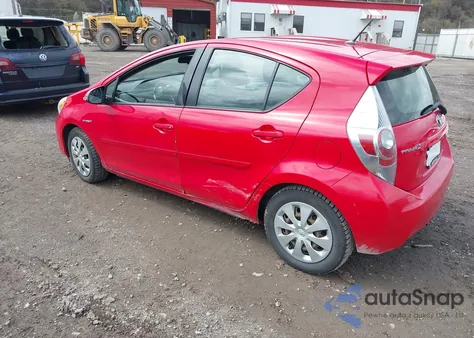 2012 Toyota Prius C from USA, damaged, VIN JTDKDTB33C1527017